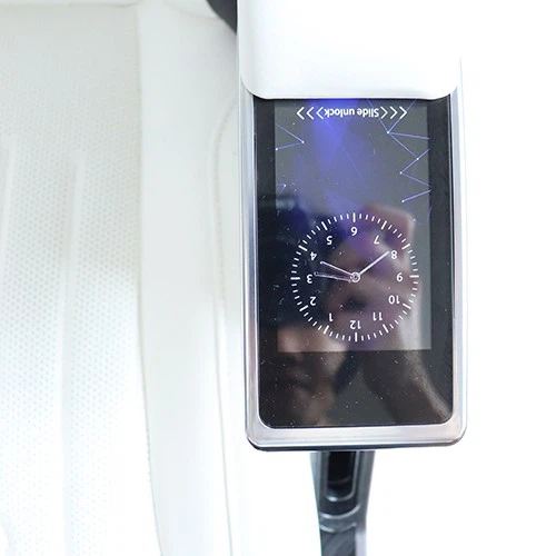 Touchscreen on the armrest of the Mercedes Sprinter seat